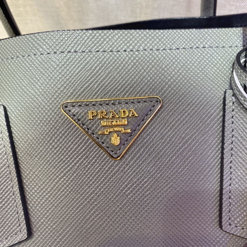 Pra*a top handle bags